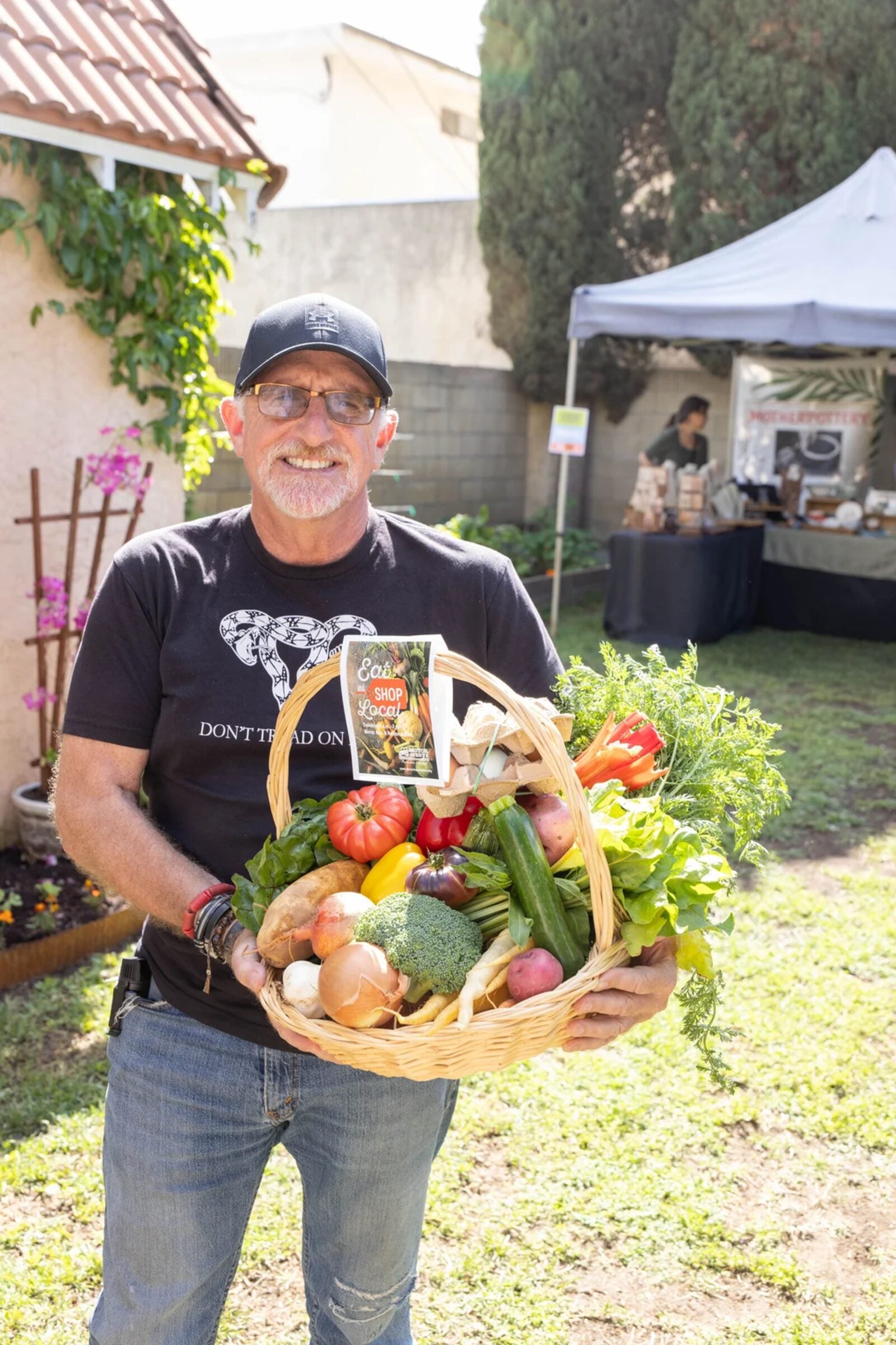Farmer with a basket of fresh produce