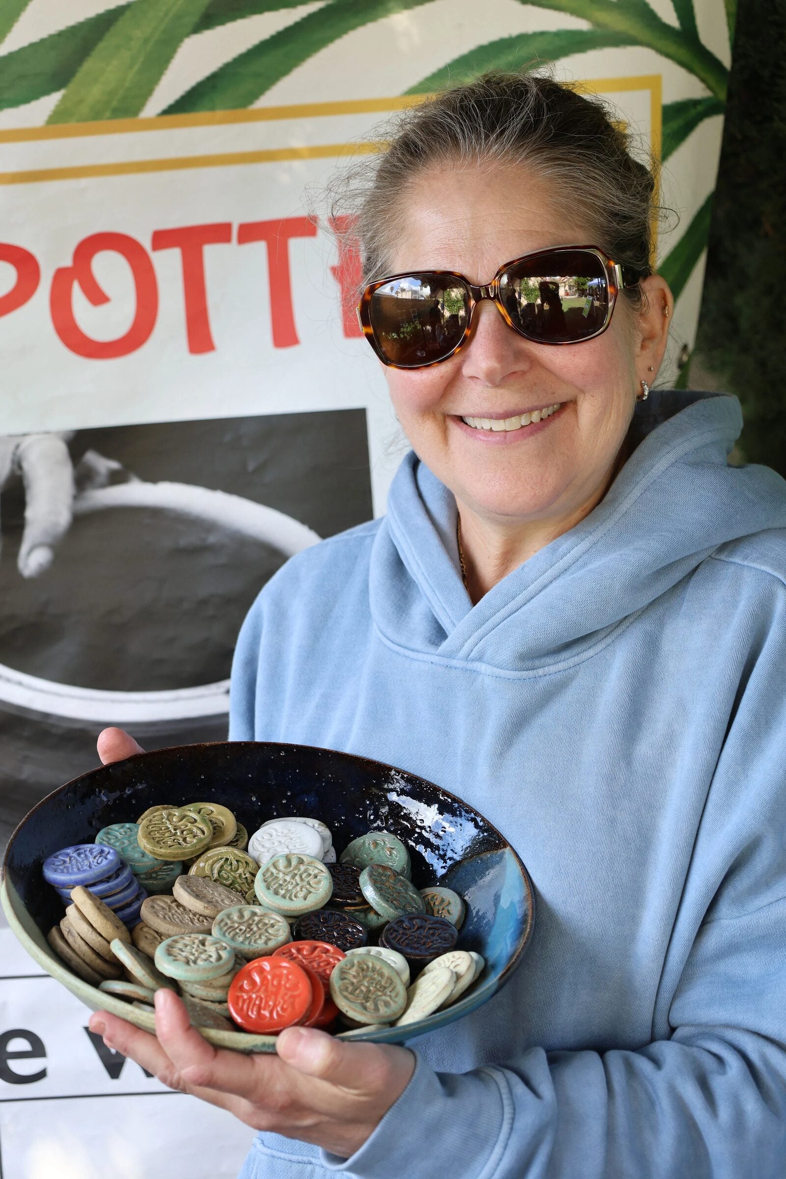 Local potter showing her ceramic work